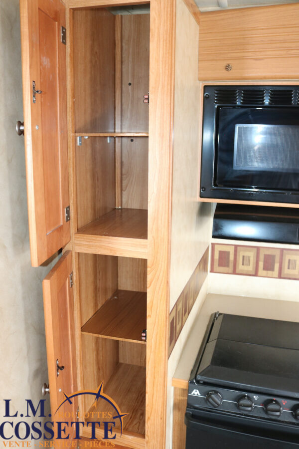 Ion 258 RB 2011-LM Cossette inc. vr-roulotte-fifth wheel-cargo-arctic wolf -Remote-Clipper-cherokee-grey wolf-wolf pup-kodiak cub-aspen trail-dutchmen-forest river-freedom express select-coachmen-apex nano -Trois-Rivières