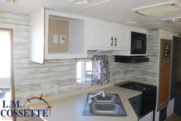 Conquest 30 BHS 2006-LM Cossette inc. vr-roulotte-fifth wheel-cargo-arctic wolf -Remote-Clipper-cherokee-grey wolf-wolf pup-kodiak cub-aspen trail-dutchmen-forest river-freedom express select-coachmen-apex nano -Trois-Rivières-fond